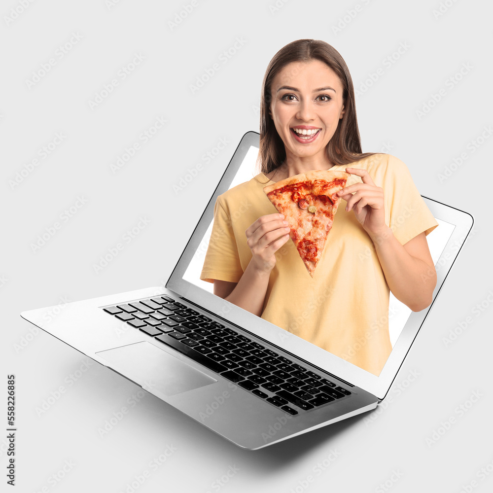 Young woman with slice of hot tasty pizza on white background