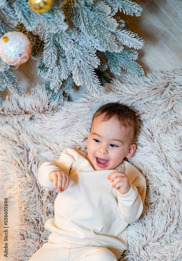 Merry bright christmas. Lovely baby boy enjoy christmas. Little child celebrate christmas at home. F