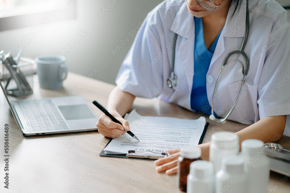 Medical technology concept. Doctor working with mobile phone and stethoscope and digital tablet lapt