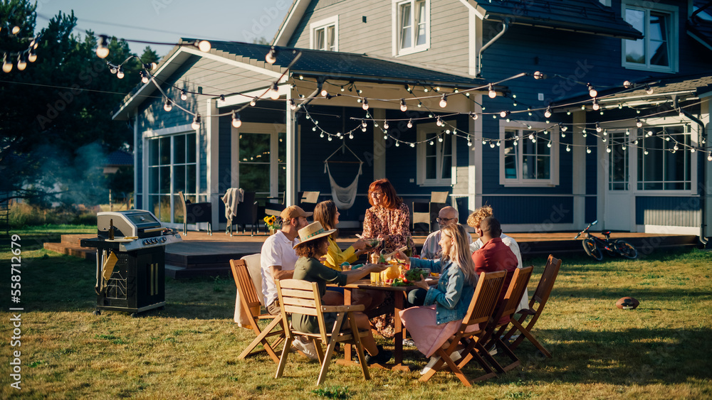 Parents, Children, Relatives and Friends Having an Open Air Barbecue Dinner in Their Backyard. Old a