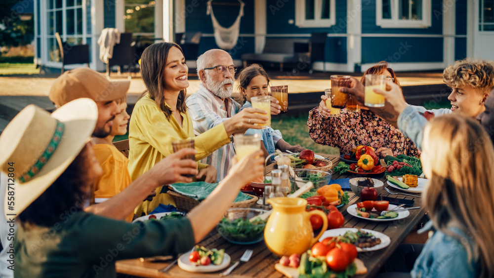 Family and Multiethnic Diverse Friends Gathering Together at a Garden Table Dinner. Old and Young Pe