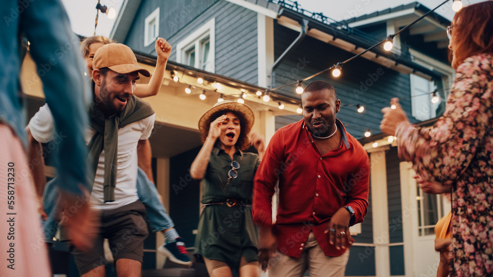 Diverse Multicultural Friends and Family Dancing Together at an Outdoors Garden Party Celebration. Y