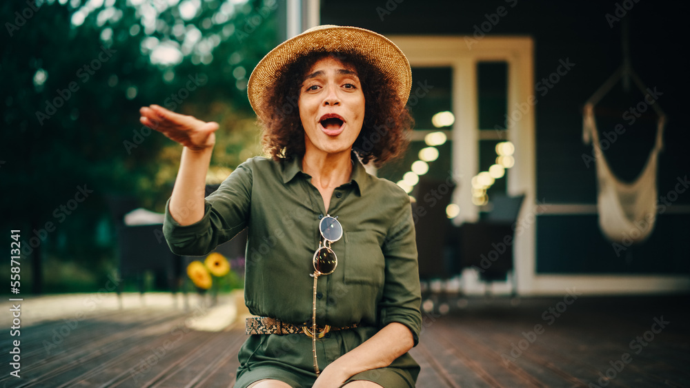 Portrait of a Beautiful Multiethnic Female Dancing and Having Fun on a Porch of a Residential Home. 