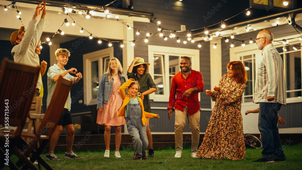 Group of Multicultural Diverse Friends and Relatives Having Fun and Dancing Together at an Evening G