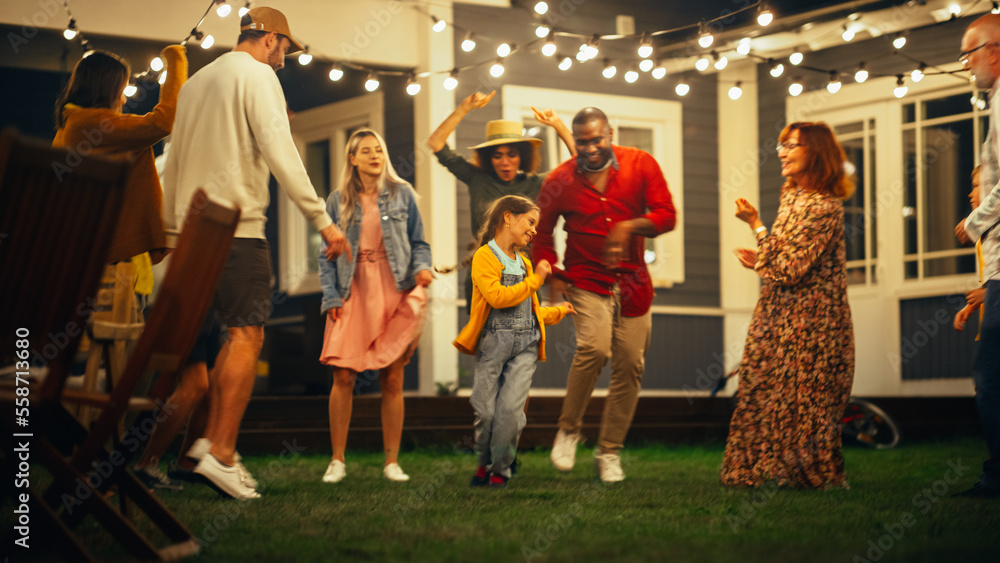 Diverse Multicultural Friends and Family Dancing Together at an Outdoors Garden Party Celebration. Y