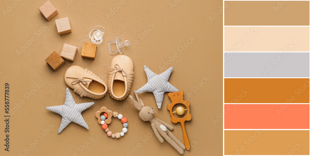 Baby booties with toys on brown background. Different color patterns