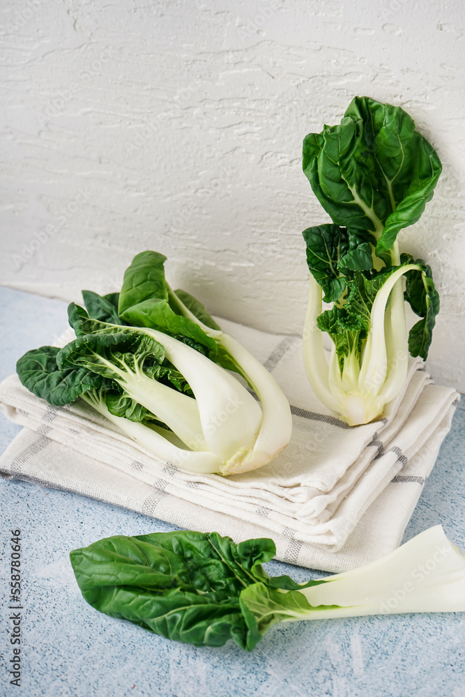 Fresh pak choi cabbages on light table