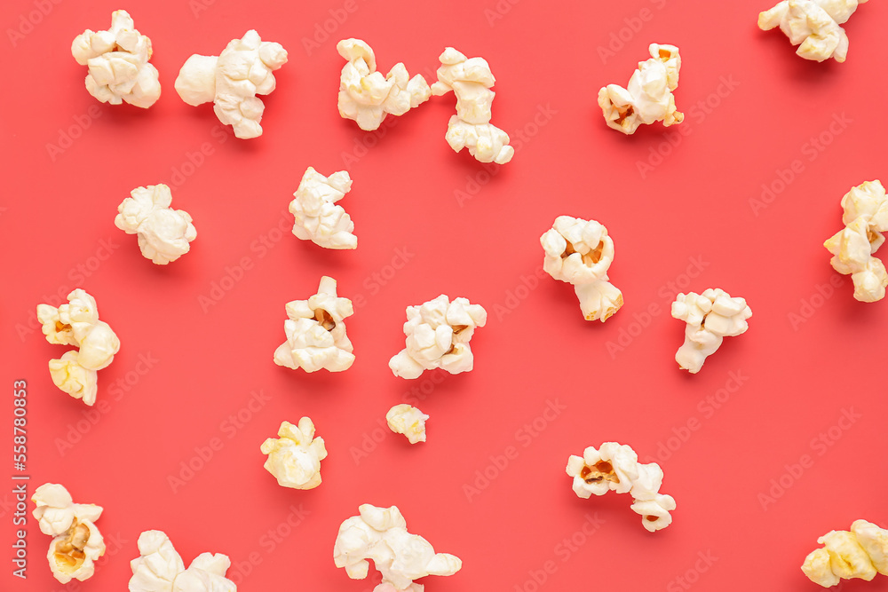 Tasty popcorn on red background