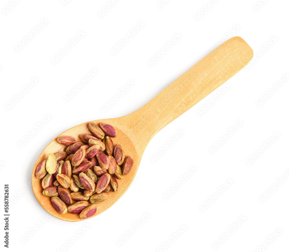 Wooden spoon with tasty pistachio nuts isolated on white background