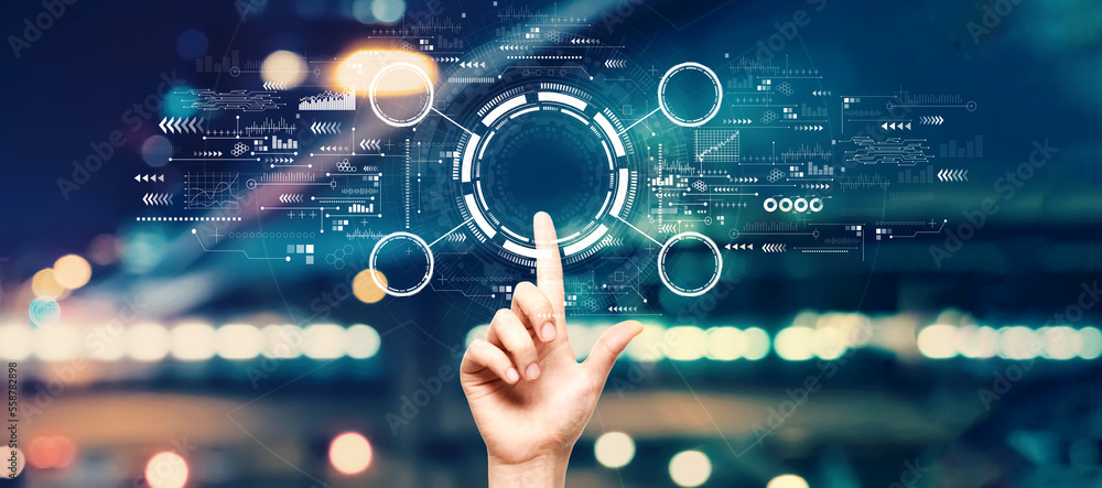 Tech circle with hand pressing a button on a technology screen