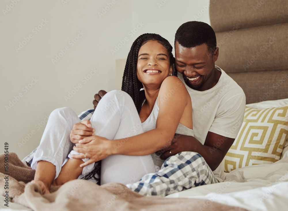 Love, black couple on bed and play together for bonding, loving and romantic weekend. Romance, man a