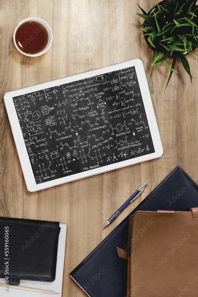 Mathematic equations and modish formula on computer screen showing concept of science and education