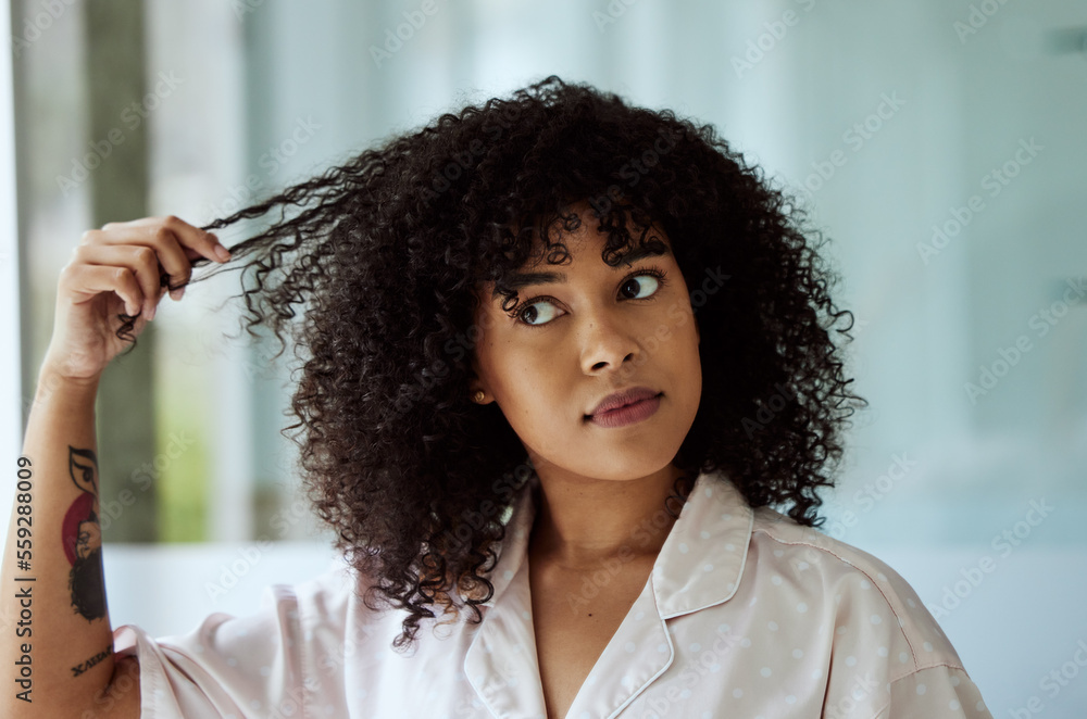 Morning, natural and black woman with hair care bathroom routine feeling curly hair texture. Beauty,