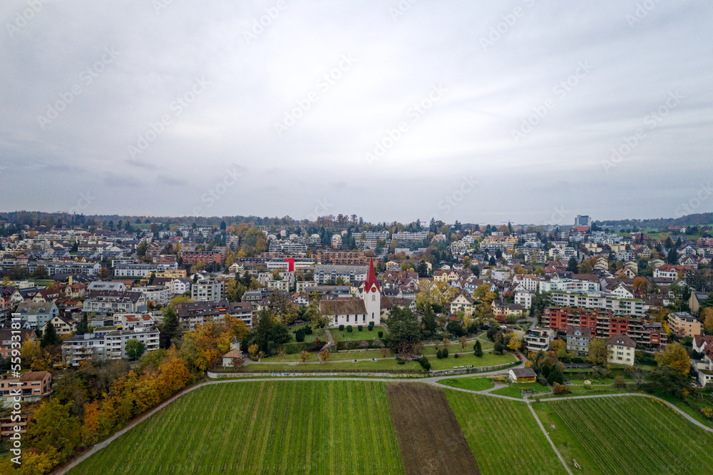 Aerial view of City of Zürich with skyline and panoramic view on a gray and cloudy late afternoon. P