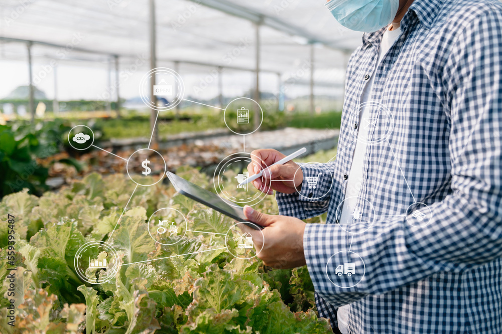 Agriculture technology farmer woman holding tablet or tablet technology to research about agricultur