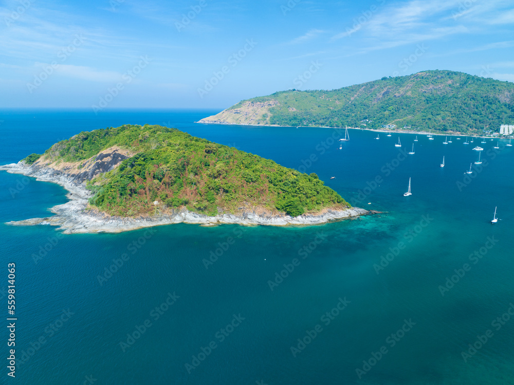 Drone aerial view shot of Tropical sea with beautiful small island in Phuket Thailand