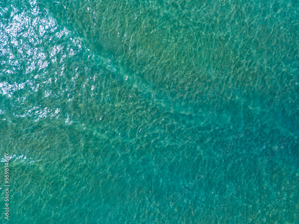 Sea surface aerial view,Bird eye view photo of blue waves and water surface texture,Turquoise sea ba