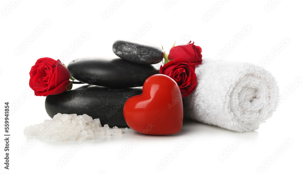 Spa stones with sea salt, towel, heart and roses on white background. Valentines Day celebration