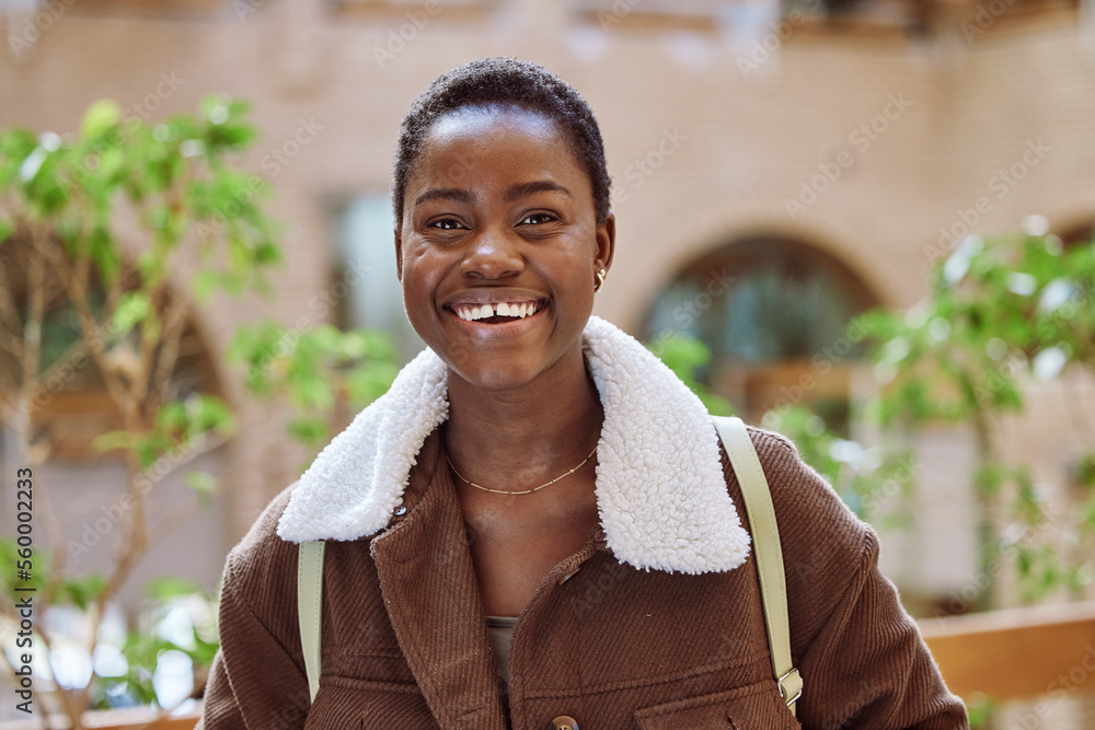 Happy, smile and portrait of a black woman student standing outdoors at a university in South Africa