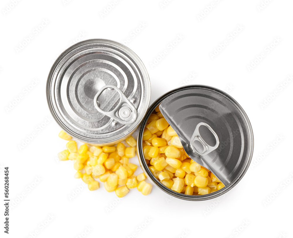 Tin cans and corn kernels isolated on white background