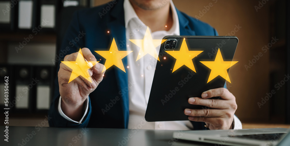 Customer or client the stars to complete five stars. with copy space. giving a five star rating. Ser