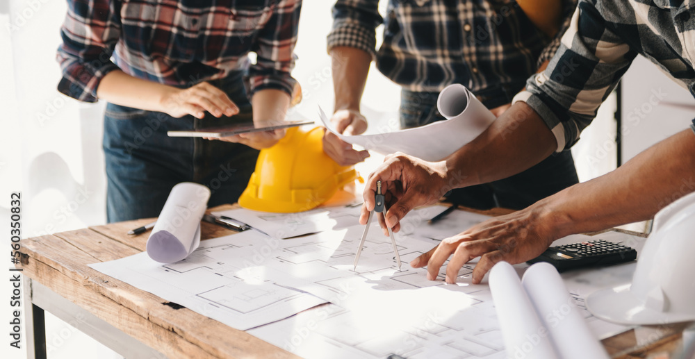 Engineer people meeting working in office for discussing, engineering .Hands of Engineer working on 