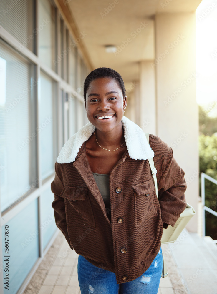 Black woman, student and portrait smile for university, education or vision for development at the c