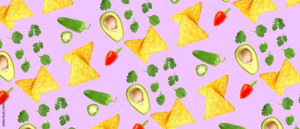 Tasty nachos with avocados, chili peppers and cilantro on lilac background