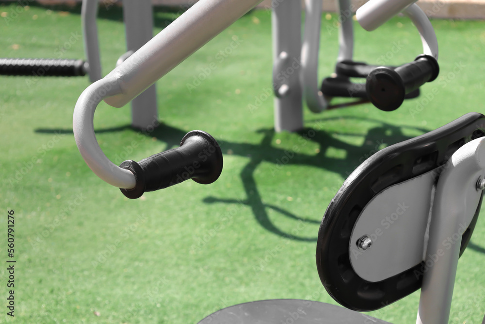 Modern exercise equipment on sport ground, closeup