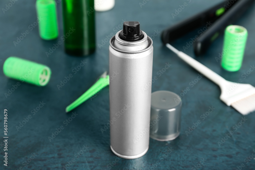 Hair spray on dark table, closeup