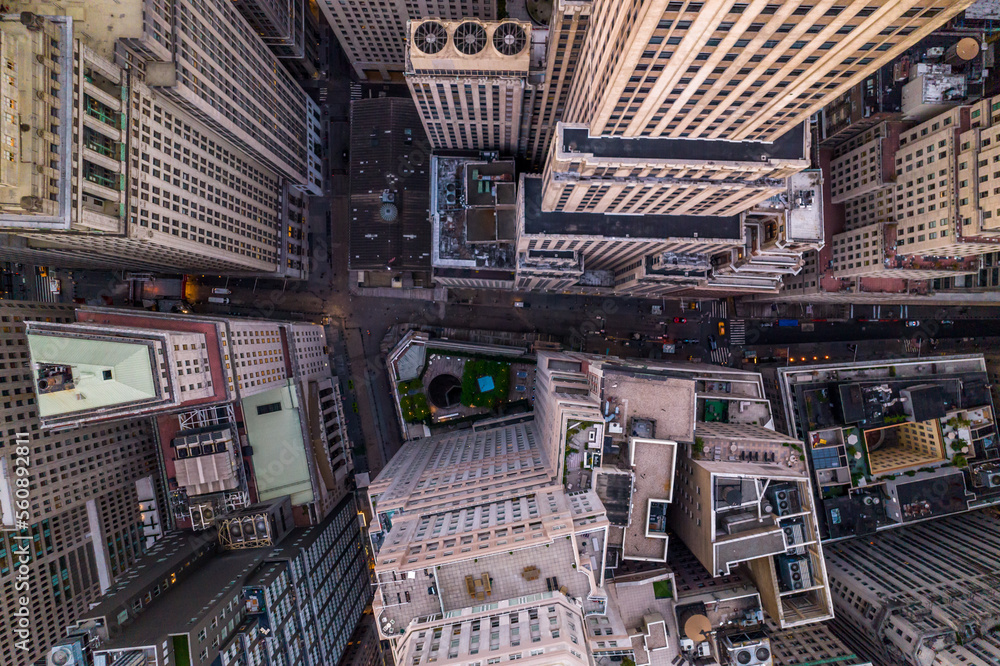 Buissnes center of Manhattan in New York durning sunset from drone. Aerial view of downtown NYC.