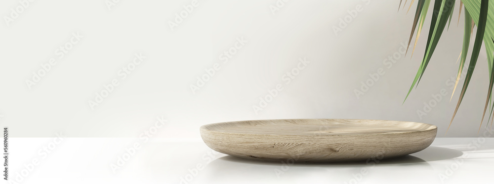 Modern, minimal round wooden podium tray on white table, palm tree in sunlight, leaf shadow on wall 