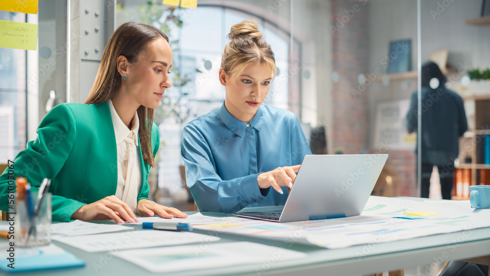 Two White Females Have a Discussion in Meeting Room Behind Glass Walls in an Agency. Creative Direct