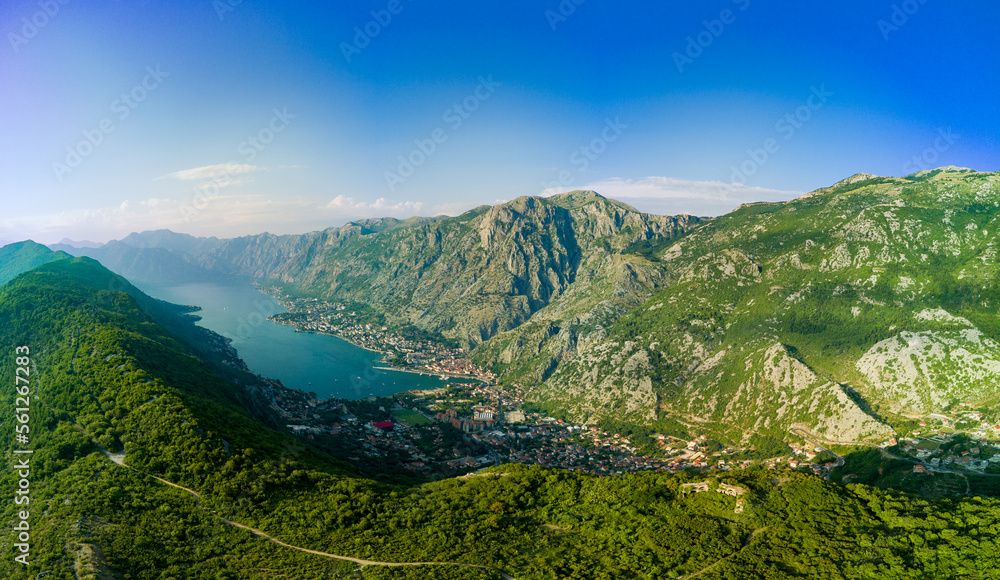 Panorama of the Bay of Kotor with beaches and hotels and the Adriatic Sea against the backdrop of su