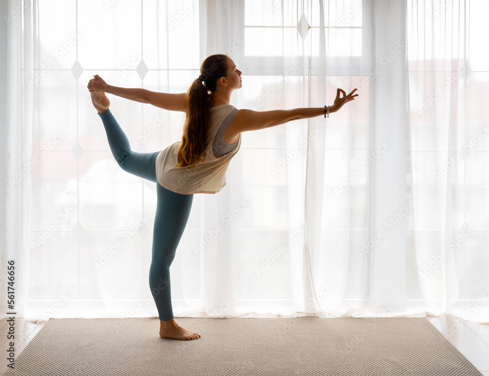 woman is doing yoga