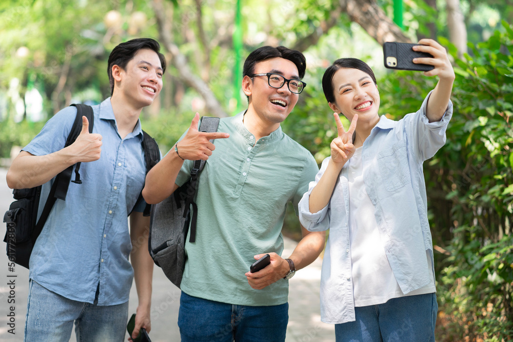 Photo of group Asian student outside