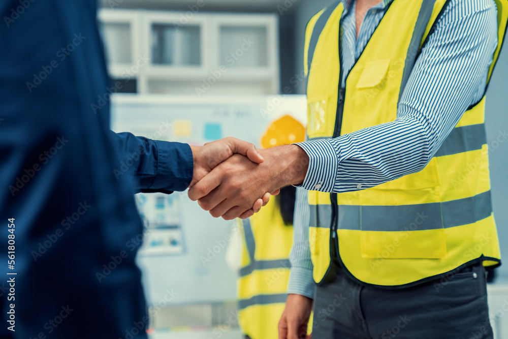 After concluding the meeting, competent investor shakes hands with engineer. Concept of the agreemen