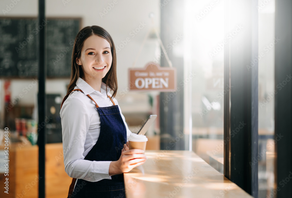 Startup successful small business owner sme woman stand with tablet  in cafe restaurant. .