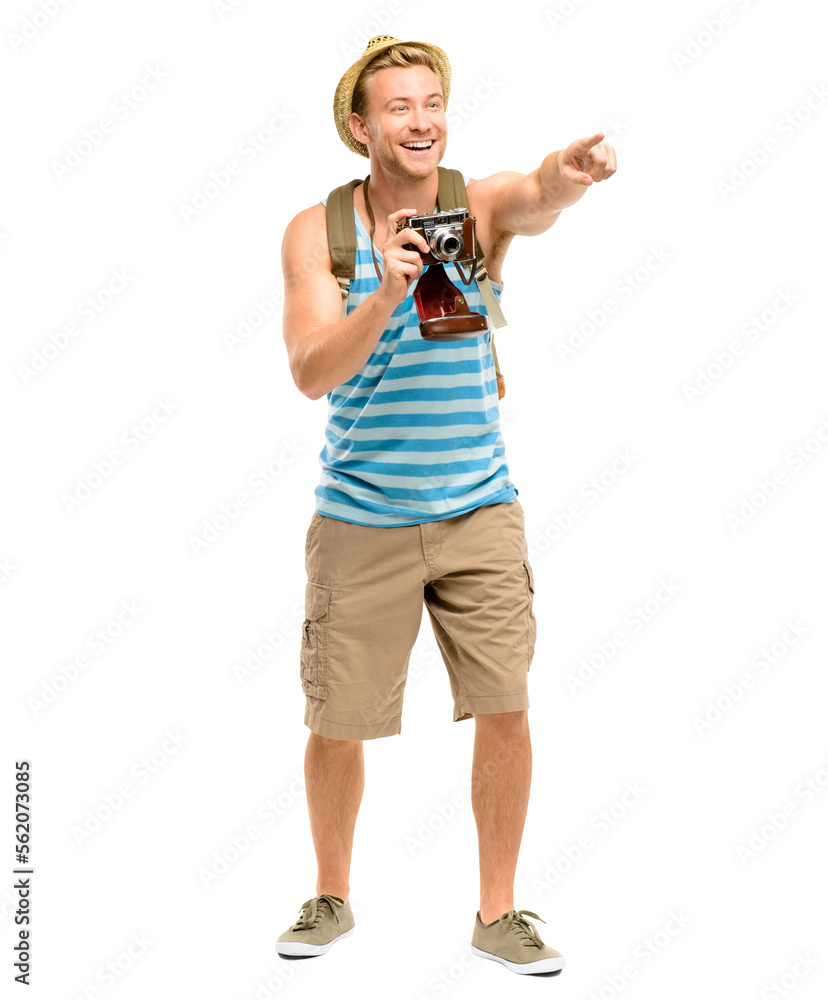 A handsome young tourist standing alone in the studio and pointing before taking a photograph isolat