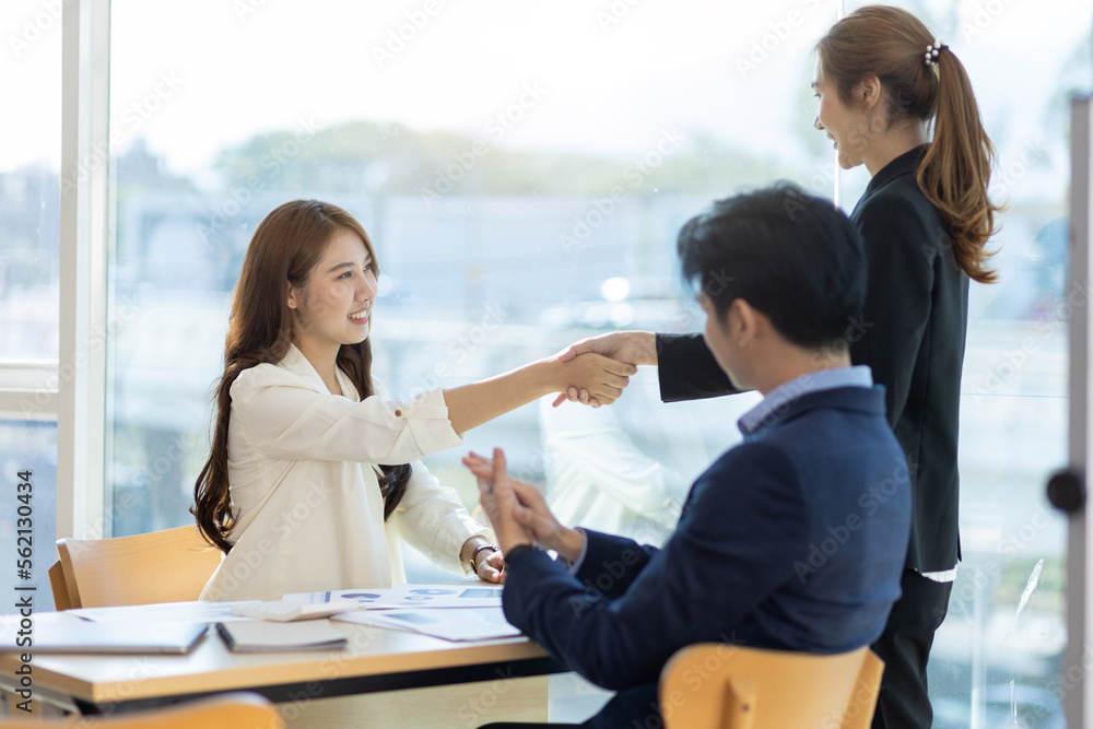 Handshake, Business partners meeting discussing cooperation agreements on business projects. Collabo