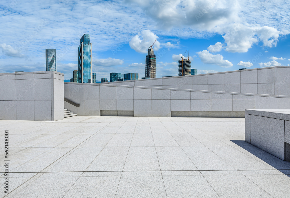 Empty square floor and city skyline with modern buildings in Ningbo, Zhejiang Province, China.