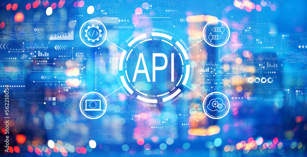 API - application programming interface concept with blurred city at night