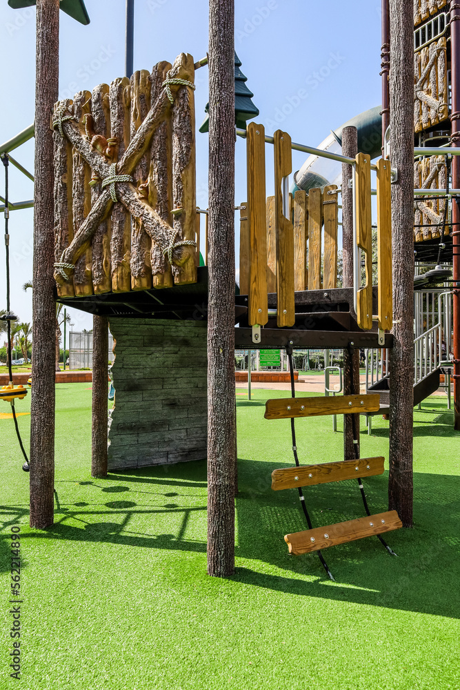 View of childrens complex with ladder on playground