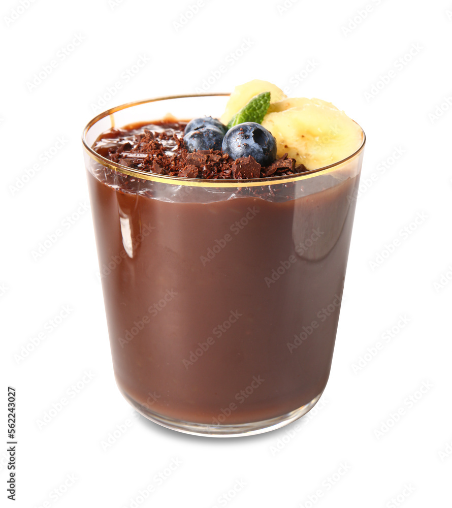 Glass of delicious chocolate pudding with blueberry, banana and mint isolated on white background