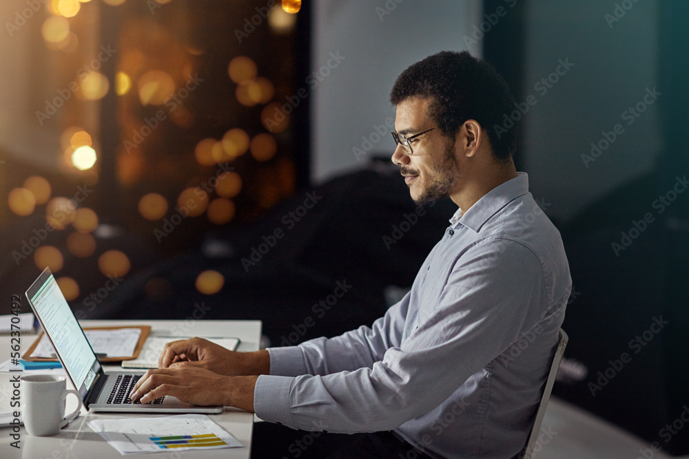 Businessman, laptop and typing with smile for research, analysis or web design on desk at the office