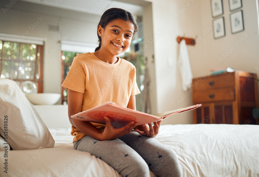 Happy little girl, reading book and bed with smile for story time, education or learning in comfort 