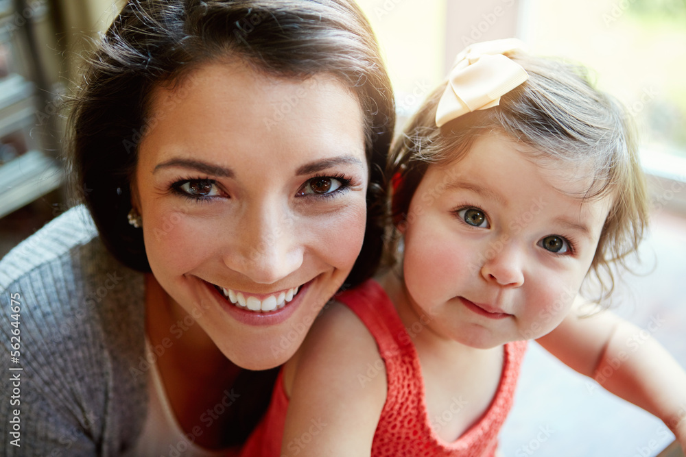 Portrait, mother and girl with smile, happiness and bonding in living room, weekend and relax togeth