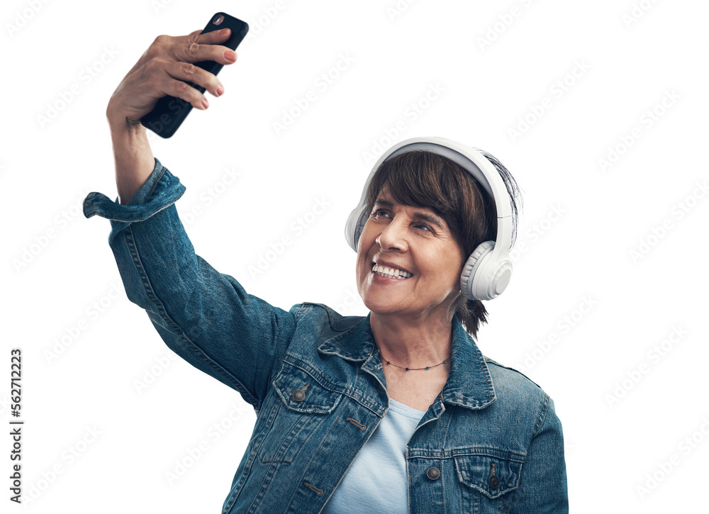 A senior woman taking selfies while wearing headphones Isolated on a PNG background.