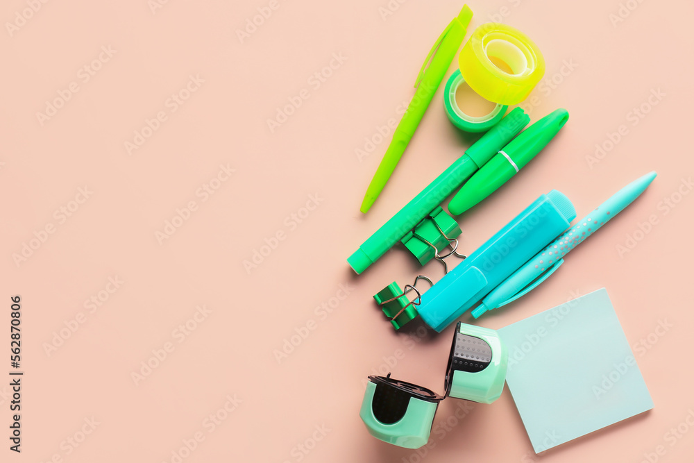 Set of stationery on pink background