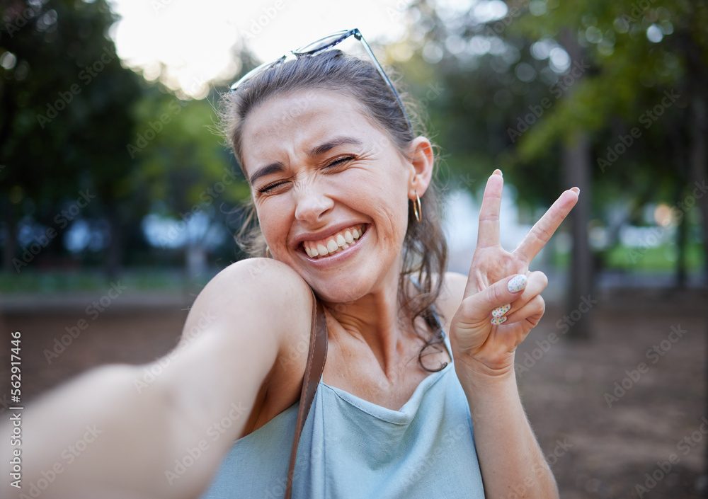 Selfie, peace and face with a woman in a park, posing for a photograph alone outdoor in nature. Soci